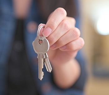 woman holding keys